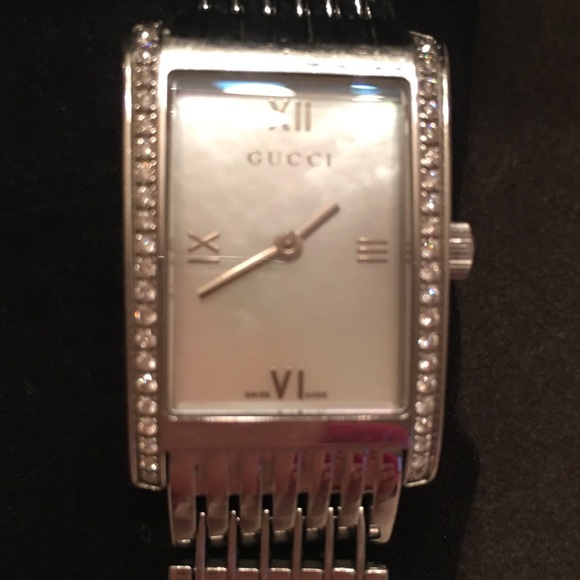 Gucci Watch ( diamonds and mother of pearl)